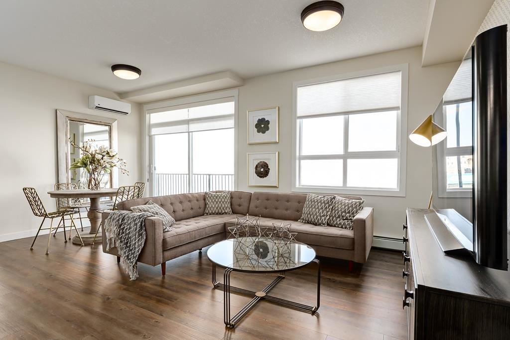 Living room in a SE Calgar townhouse for sale in Walden